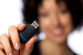 Woman holding USB stick