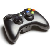 A wireless black Microsoft Xbox 360 controller with white background