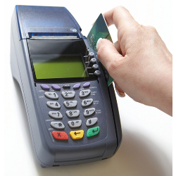 Image of credit card terminal courtesy of Shutterstock