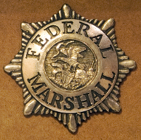 Federal Marshall badge courtesy of Shutterstock