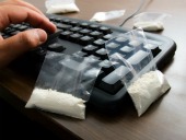 Drugs and Keyboard, courtesy of Shutterstock