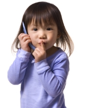 Young girl on phone. Image from Shutterstock
