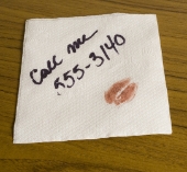 Phone number on a napkin. Image from Shutterstock