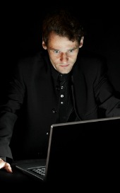 Man with laptop, courtesy of Shutterstock