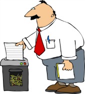 Man shredding paper, courtesy of Shutterstock