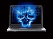 Computer and skull. Image courtesy of Shutterstock.