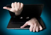 Spy on computer. Image courtesy of Shutterstock