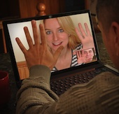 Man and woman online. Image courtesy of Shutterstock