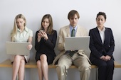 Image of professionals on a bench courtesy of Shutterstock.