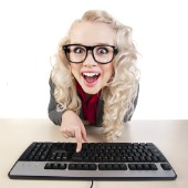 Woman on computer, image courtesy of Shutterstock