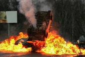 Car on fire, image courtesy of Shutterstock