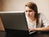Teen on laptop. Image courtesy of Shutterstock.jpg