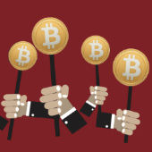 Image of auction and bitcoins, courtesy of Shutterstock