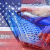 US and Russian flags, keyboard composition, courtesy of Shutterstock