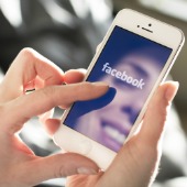 Facebook on phone. Image courtesy of Twin Design/Shutterstock