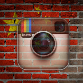 Image of China flag on brick wall courtesy of Shutterstock