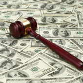Image of gavel on money courtesy of Shutterstock