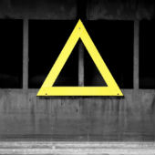 Image of warning triangle courtesy of Shutterstock