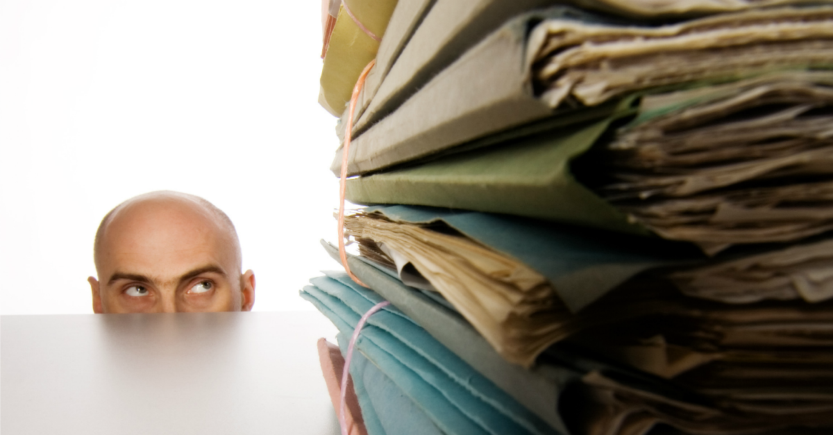 Piles of files. Image courtesy of Shutterstock.